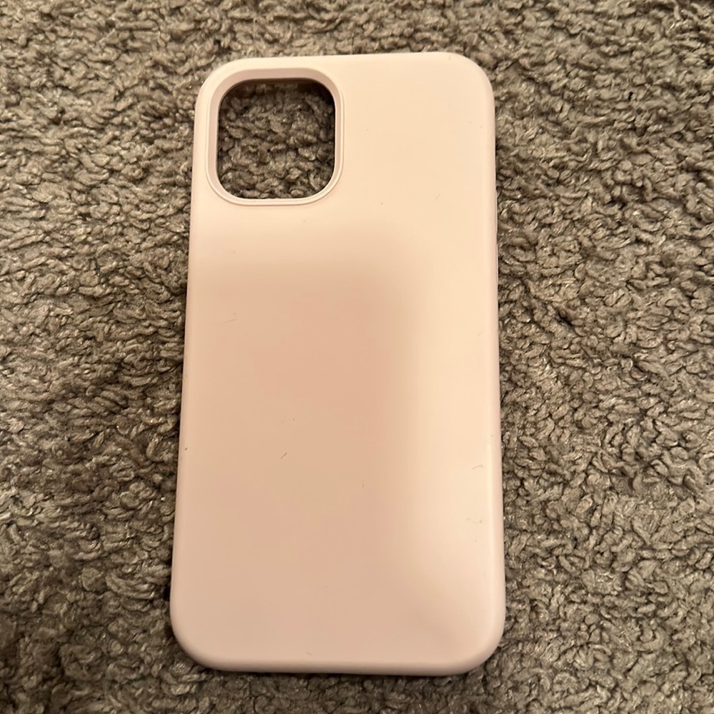 Pastel pink iPhone 12 Pro case.